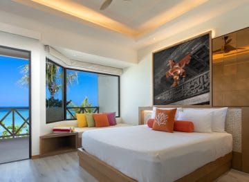 Bright and welcoming, this two-bedroom retreat connects a chic master bedroom with a playful bunk-bed room for kids. Modern comforts, smart storage, and ocean views create the perfect family escape.